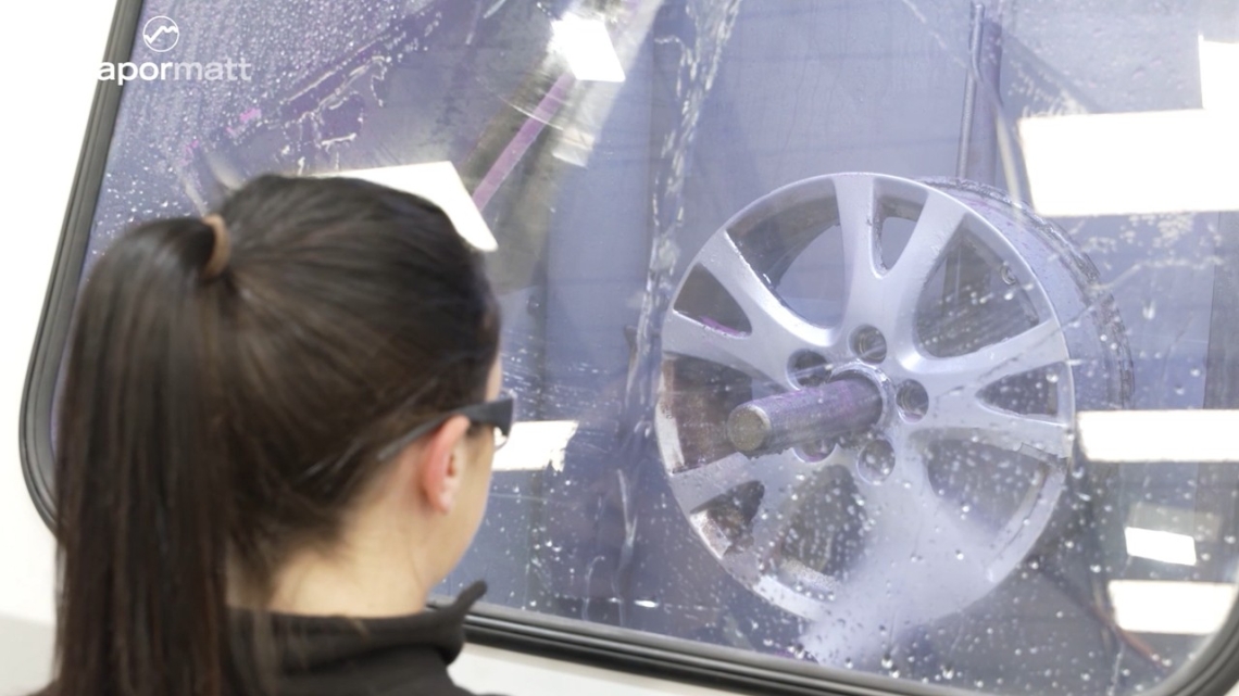 Wet blasting an alloy wheel