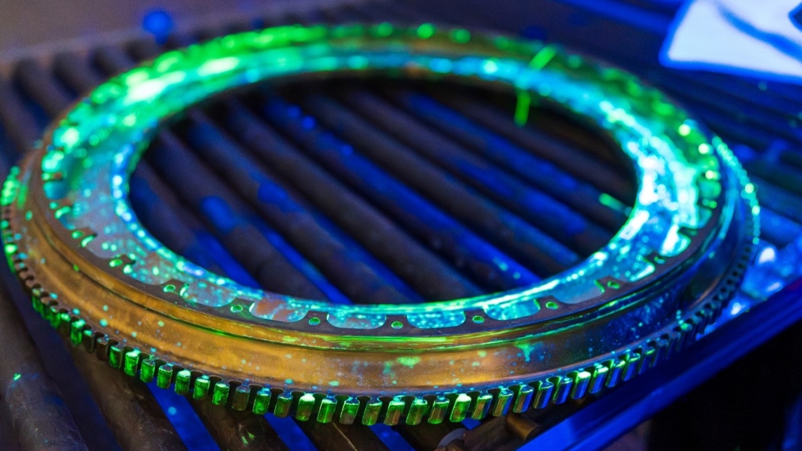 Jet engine disc undergoing FPI inspection