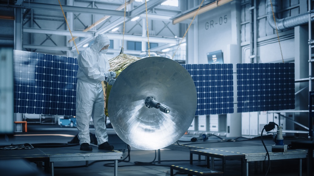 Man working with satellite